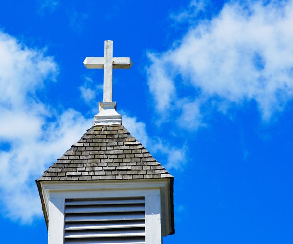 Warren Joins Buttigieg in Opposing Threat to Church Tax Status