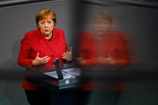 Merkel Backs Tougher Virus Curbs as German Deaths Hit Record