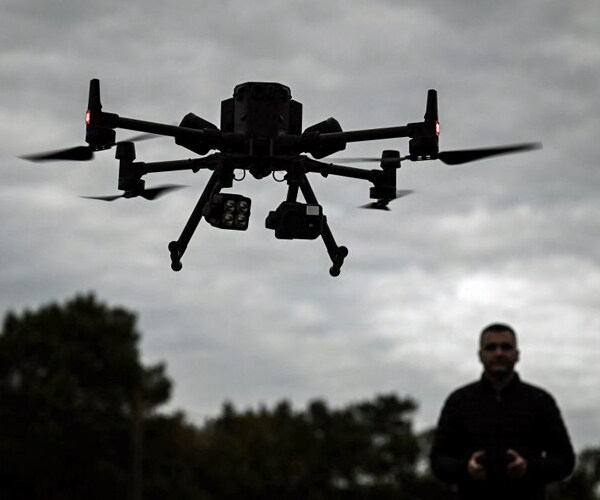 a drone is pictured in flight