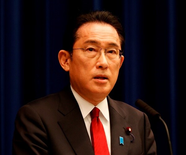 Fumio Kishida speaks at a news conference