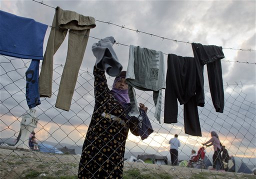 The Latest: Greece Sends 51 Migrants Back to Turkey