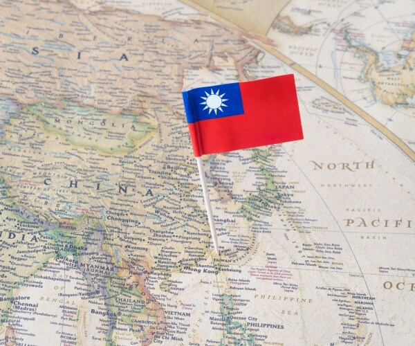 taiwan paper flag pin on a map