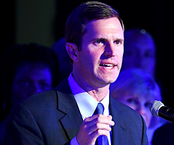 andy beshear speaks during a campaign rally