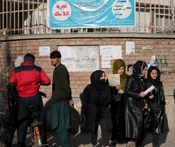 Armed Guards Stop Afghan Women Entering Universities After Taliban Ban