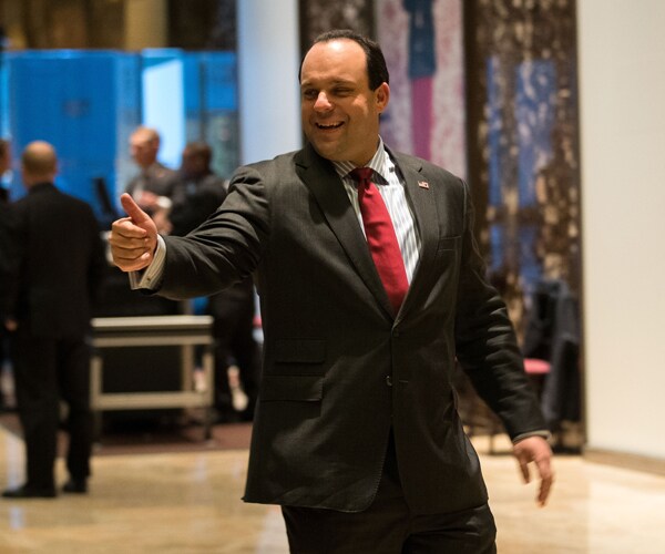 boris epshteyn standing in the lobby of trump tower in manhattan