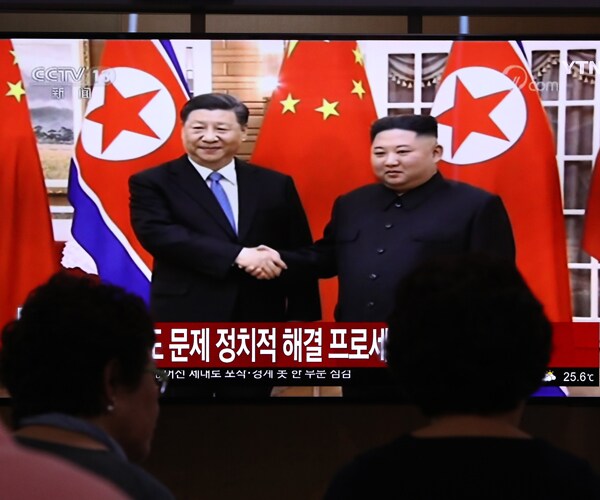 chinese president xi jinping and north korean leader kim jong un