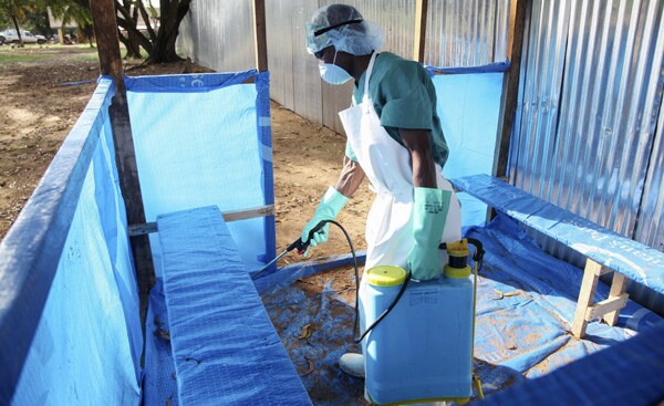 Ebola Health Workers Battle Death, Heat, Rumors