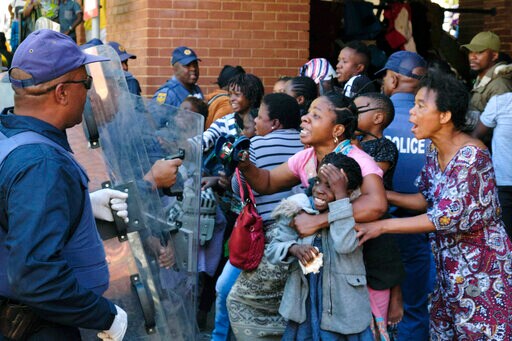 South African Police Disperse Refugees Protesting Attacks