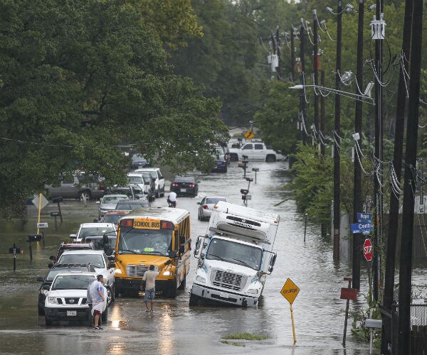 2 Dead as Imelda Strands Drivers, Floods Homes in Texas