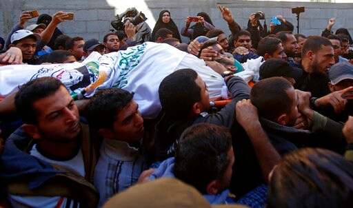 The Latest: Israel Launches Strikes after Gaza Fire Hurts 6