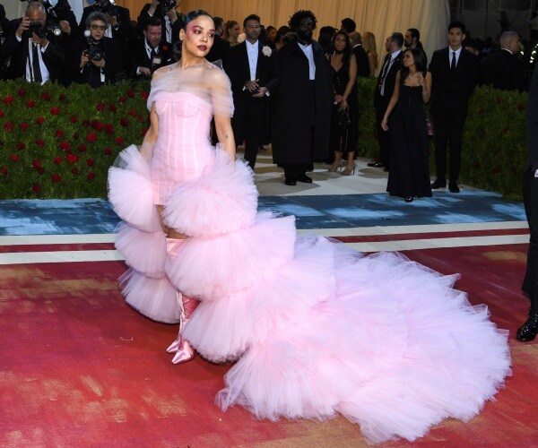 tessa thompson poses on the red carpet