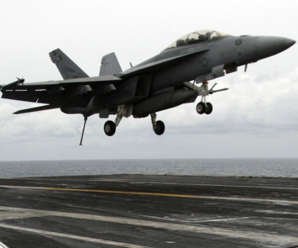 a us aircraft carrier is shown