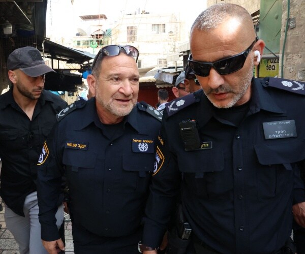 yaakov shabtai and doron david torgeman walk in the old city of jerusalem