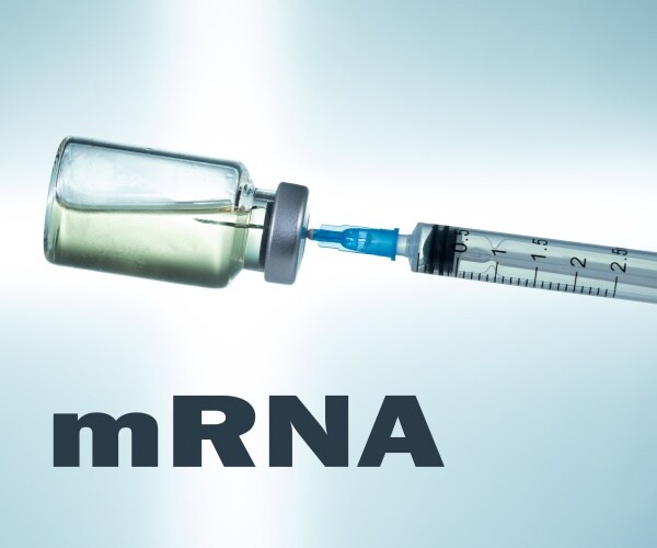 a vial of vaccine, syringe, labeled mRNA vaccine