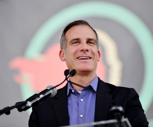eric garcetti is shown speaking at a conference in los angeles