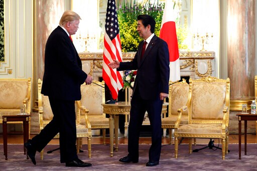 The Latest: Trump, Abe Hold Talks on North Korea, Trade