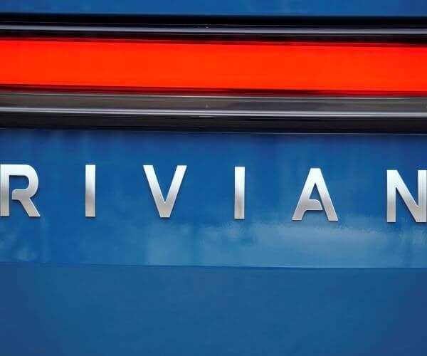 Rivian to Cut 6% of Jobs Amid EV Price War
