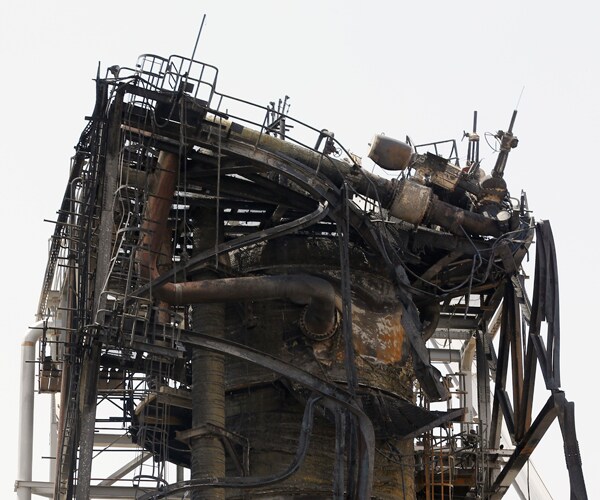 Damage to a Saudi Arabian oil processing facility is shown