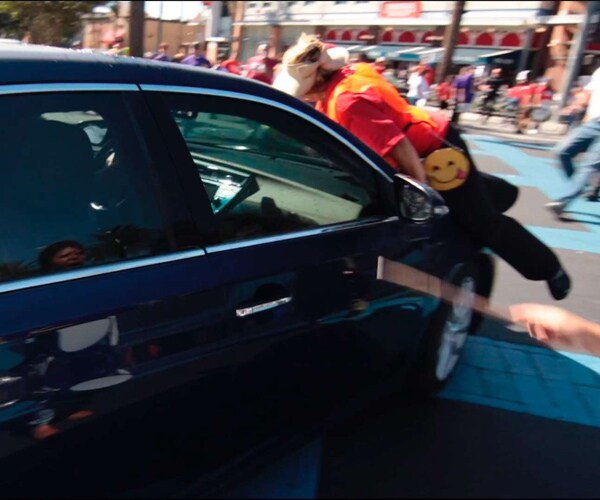 Man Drives into Immigration Protest in California