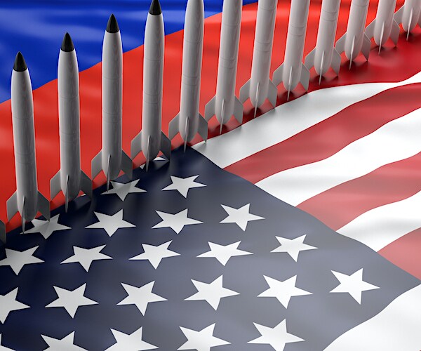 american flag and russian flag and nuclear missiles on top of them in an graphic illustration
