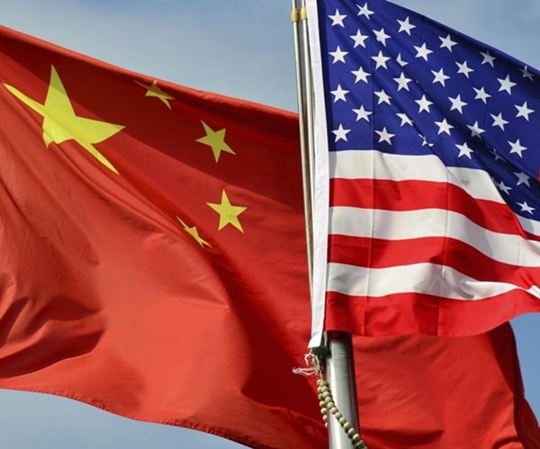 Chinese Tycoons Plant Money Management Flags on Wall Street 