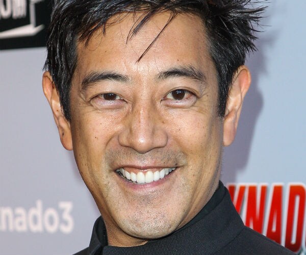 Grant Imahara attends a premiere at iPic Theaters Westwood on in Los Angeles in 2015 wearing all black.