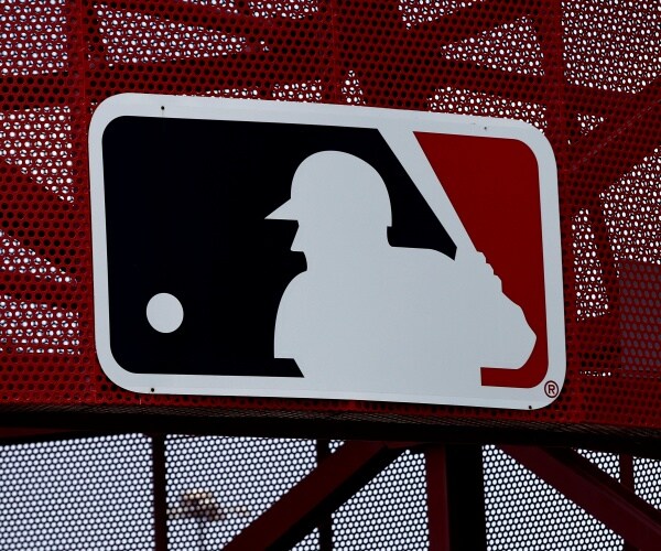 Major League Baseball is making its first investment in women's professional sports by partnering wi...