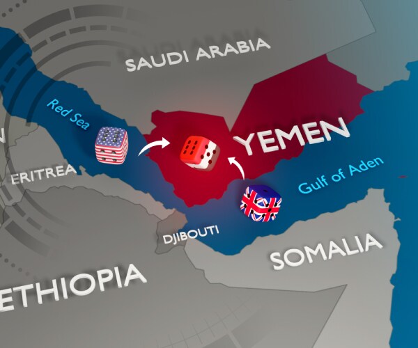 map of yemen with dice imprinted with flags of the united states great britain and yemen on them