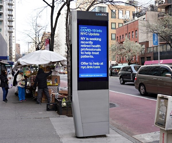 a sign in new yorks calls for retired healthworkers to help during the pandemic
