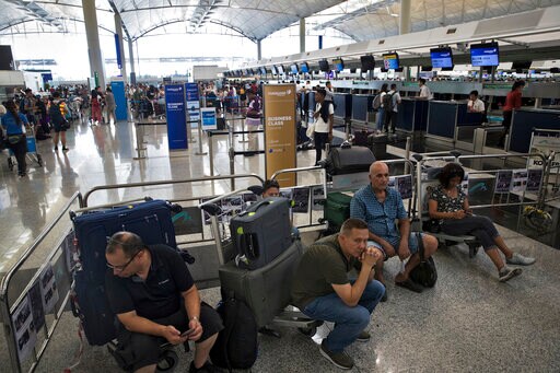 The Latest: Hong Kong Airport Cancels All Departing Flights