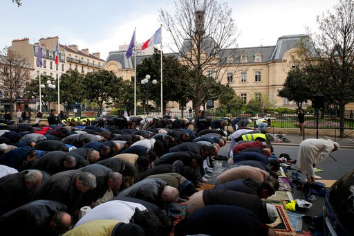 Muslims Protest with Street Prayer in Paris Suburb