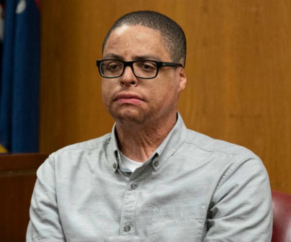 alonzo yanes is shown testifying in court, with visible scars