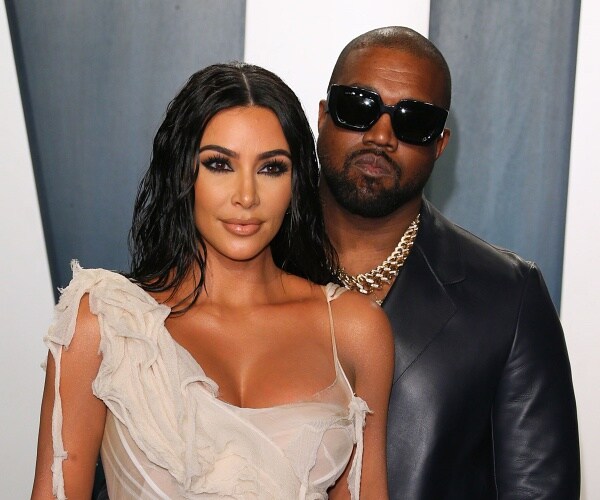 kim kardashian and kanye west arrive at oscar party