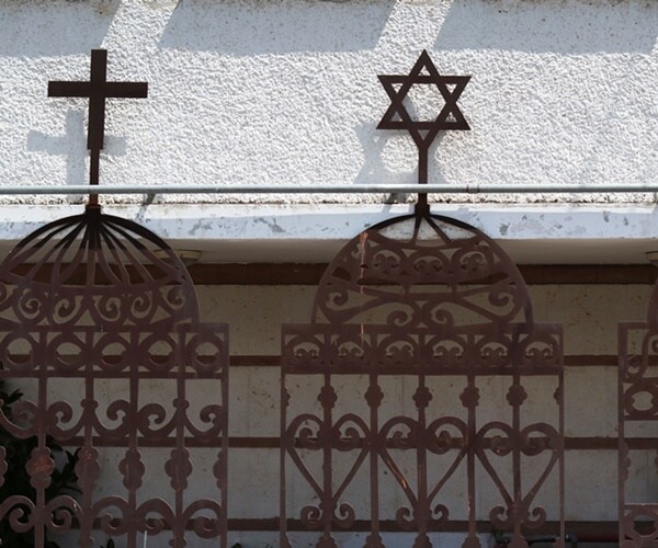 a star of david and a cross