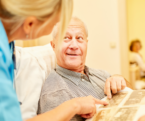 alzheimer's patient scans a photo album