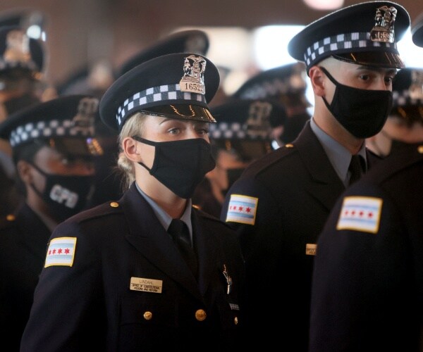 Chicago Police officers in dress uniform.
