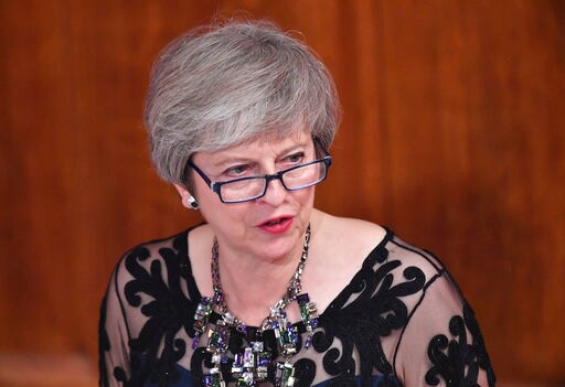 The Latest: UK Cabinet to Discuss Draft Brexit Deal