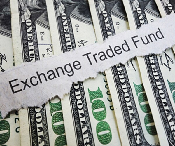exchange traded fund newspaper headline on cash 

