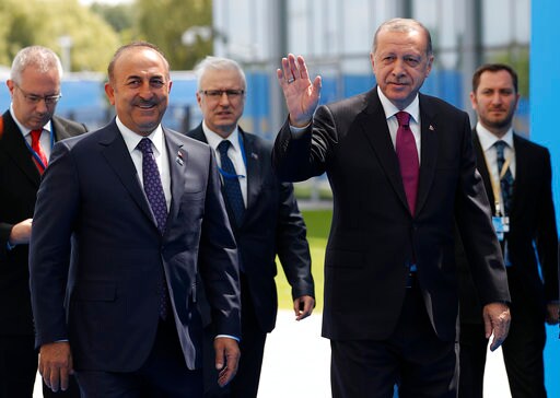 The Latest: NATO Summit: Turkey Defends Weapons Purchase