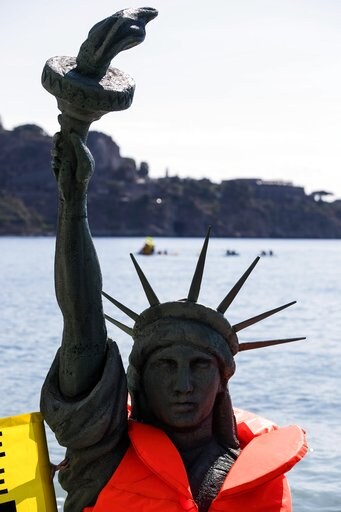 The Latest: Tusk: We Must be 'tough, Even Brutal' on Terror