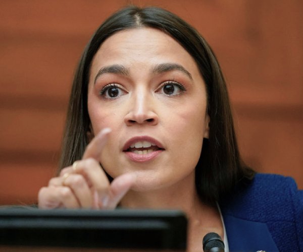 rep. alexandria ocasio-cortez speaks during a hearing