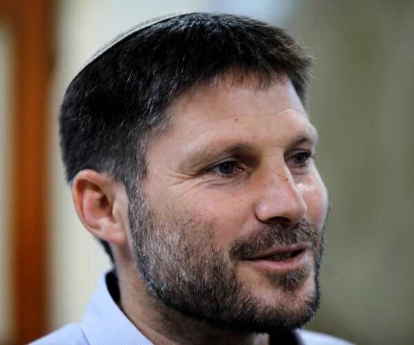 israeli finance minister bezalel smotrich looks on
