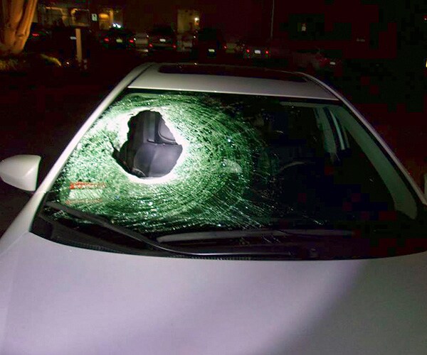 Boulder Dropped From Overpass Kills Husband, Father in Car Below