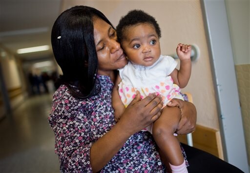 German Chancellor's New Namesake: Refugee Baby from Ghana