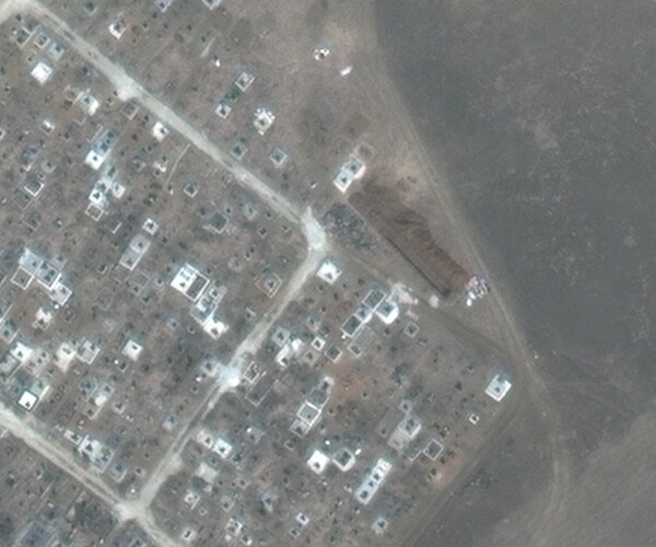 More Mass Graves Near Mariupol Revealed in New Satellite Images