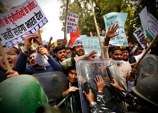 Supporters of Protesting Indian Farmers Scuffle with Police