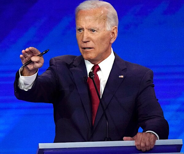 former vice president joe biden gestures during a democratic presidential primary debate