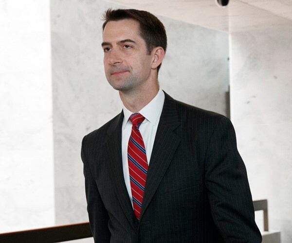 tom cotton walks through halls of congress