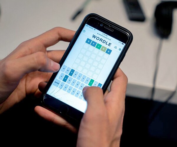 the online word game wordle is played on a mobile phone