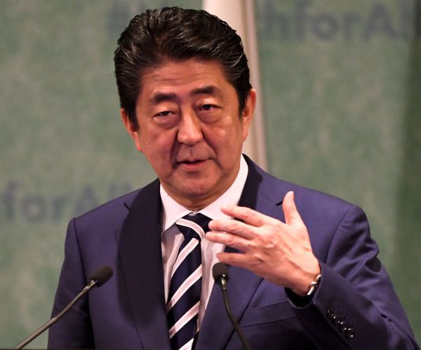 Japan's Abe Urges Central Bank's Kuroda to Keep up Efforts on Economy